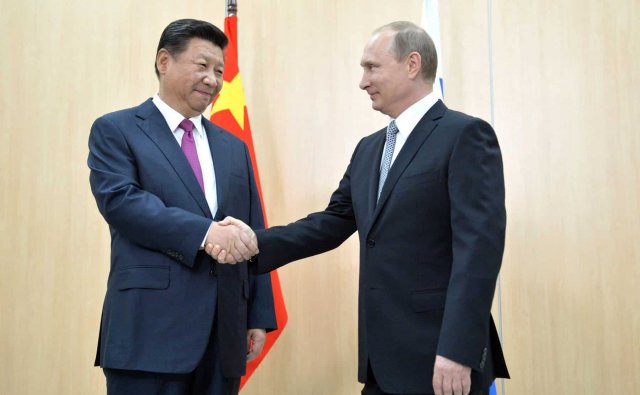 Russia ge raees Putin, China ah vadaigenfi